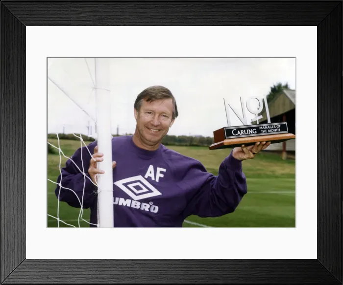 Framed Print : Manchester United manager Alex Ferguson holding his Carling Manager of the Month Award