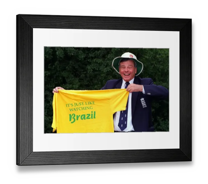 Framed Print : World famous cricket umpire Harold Dickie Bird holding a T-Shirt that barnsley fanswear Framed Print : World famous cricket umpire Harold Dickie Bird holding a T-Shirt that barnsley fanswear