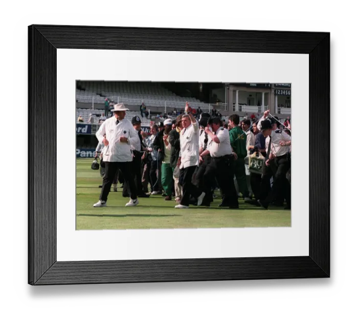 Framed Print : Umpire Dickie Bird waves to the crowd at the end of his last match as a Test Umpire in Framed Print : Umpire Dickie Bird waves to the crowd at the end of his last match as a Test Umpire in