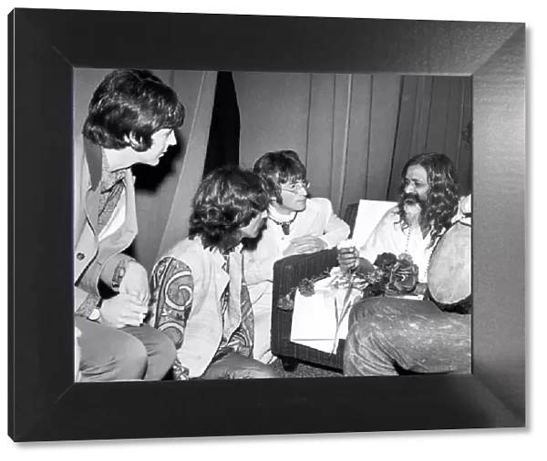 Beatles members left to right: Paul McCartney, George Harrison