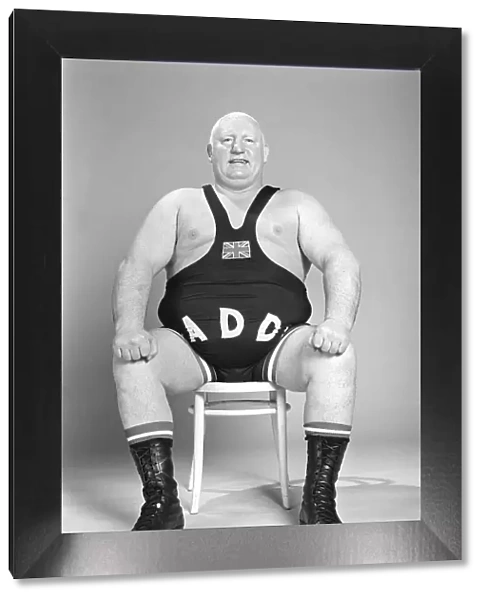 Wrestler Shirley Crabtree alias Big Daddy, poses in the Mirror studio