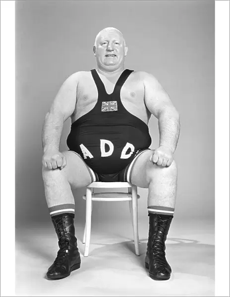 Wrestler Shirley Crabtree alias Big Daddy, poses in the Mirror studio