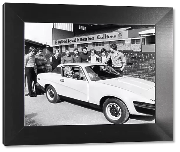 Birmingham City footballers looking at the new TR7 Sports car that one of them could win