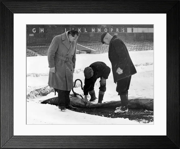 Framed Print : Birmingham City manager Gil Merrick (left) takes a close look at the St Andrews pitch as Framed Print : Birmingham City manager Gil Merrick (left) takes a close look at the St Andrews pitch as