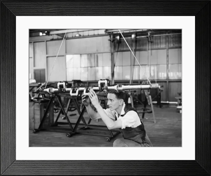 Framed Print : Engineer examines the prop shaft of the Gipsy Six engine during the construction of Framed Print : Engineer examines the prop shaft of the Gipsy Six engine during the construction of