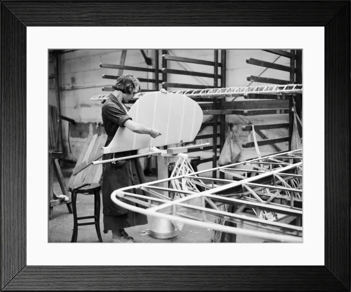 Framed Print : Woman fitting the rudder during the construction of the Miles 3 Falcon aircraft Framed Print : Woman fitting the rudder during the construction of the Miles 3 Falcon aircraft