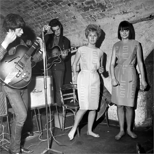 Girls wearing Beatles dresses at the Cavern Club in Liverpool, December 1963