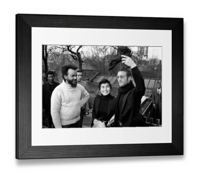 Framed Print : John Lennon and Yoko pictured on the roof of Black House in Holloway Road, with Michael X Framed Print : John Lennon and Yoko pictured on the roof of Black House in Holloway Road, with Michael X