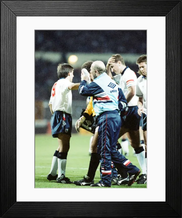 Framed Print : England v Brazil 28th March 1990, Wembley. Peter Shilton is led from the field by physio Framed Print : England v Brazil 28th March 1990, Wembley. Peter Shilton is led from the field by physio