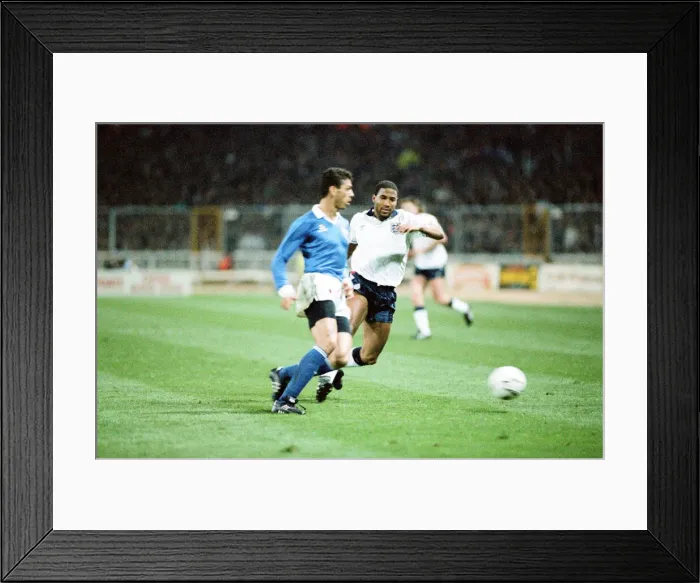 Framed Print : England v Brazil 28th March 1990, Wembley. John Barnes in action against Brazil Framed Print : England v Brazil 28th March 1990, Wembley. John Barnes in action against Brazil