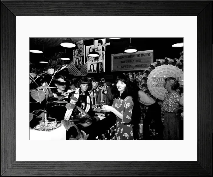 Framed Print : Singer Kate Bush at Virgin Records in Eldon Square, Newcastle signing autographs