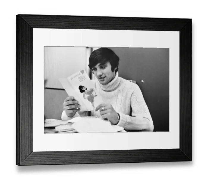 Framed Print : Manchester United footballer George Best reading his Valentines cards Framed Print : Manchester United footballer George Best reading his Valentines cards