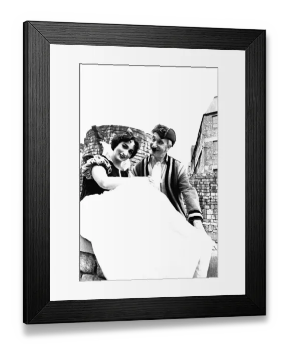 Framed Print : Carol Leroy and Nat Jackley on a photoshoot on the Newcastle City Walls for Framed Print : Carol Leroy and Nat Jackley on a photoshoot on the Newcastle City Walls for