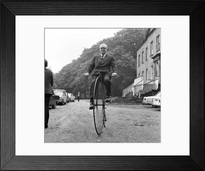 Framed Print : Mr Philip Yorke takes a trip around the grounds of his house on a Penny Farthing Framed Print : Mr Philip Yorke takes a trip around the grounds of his house on a Penny Farthing