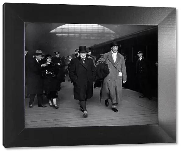 Winston Churchill with Lord Wodehouse at Victoria Train Station en route for Paris