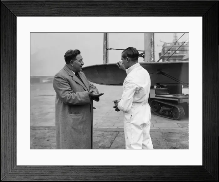 Framed Print : Ground crew seen here applying Killfrost'anti icing agent to the wings of