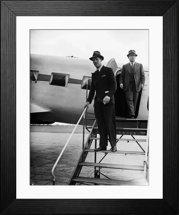 Framed Print : Prince Axel of Denmark on a official visit dis-embarks from Danish Air Lines