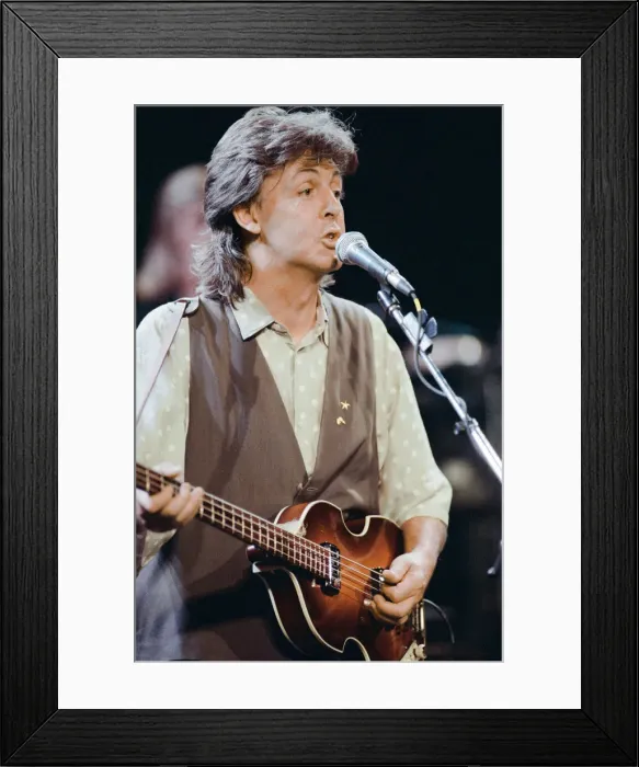 Framed Print : Paul McCartney, former member Of The Beatles, performing in concert. July 1989 Framed Print : Paul McCartney, former member Of The Beatles, performing in concert. July 1989