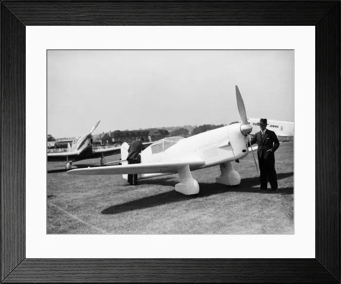 Framed Print : Captain Percival seen her with his Mew Gull aircraft at the 1935 Hendon Air Display 29th Framed Print : Captain Percival seen her with his Mew Gull aircraft at the 1935 Hendon Air Display 29th