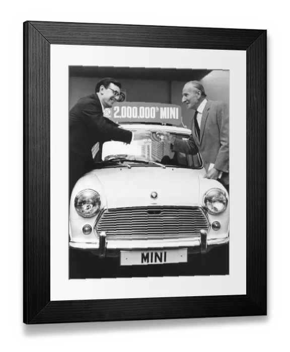 Framed Print : George Turnball left and Sir Alec Issigonis celebrating the 2, 000
