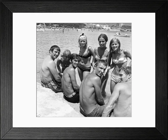 Framed Print : Manchester United footballer George Best with friends including Mike Summerbee cool off