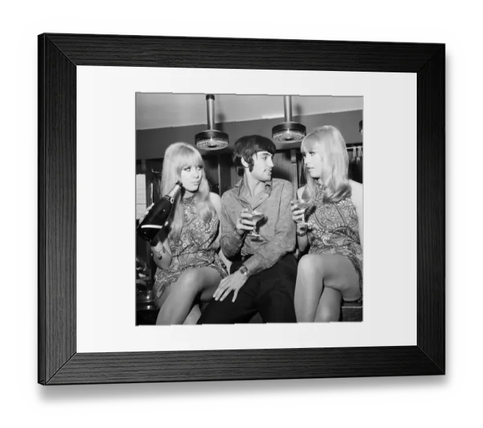 Framed Print : Manchester United footballer George Best celebrates the opening of his fashion boutique Framed Print : Manchester United footballer George Best celebrates the opening of his fashion boutique