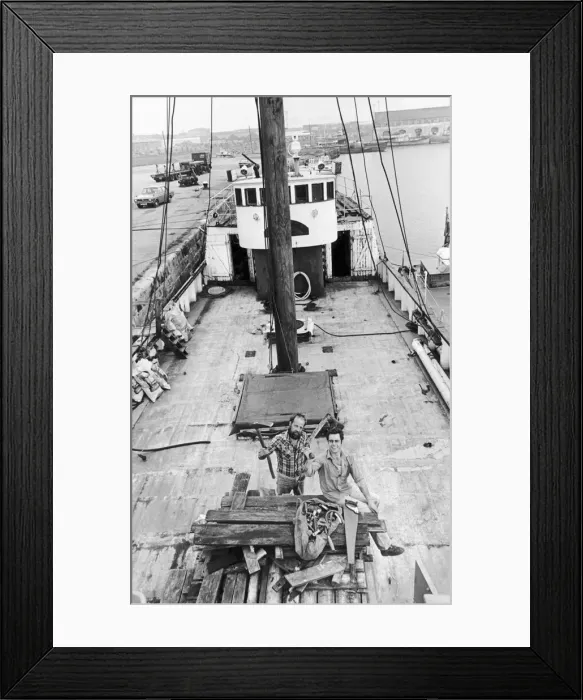 Framed Print : David Wharton a boat fitter and joiner and David Carter seen here near the end of Framed Print : David Wharton a boat fitter and joiner and David Carter seen here near the end of