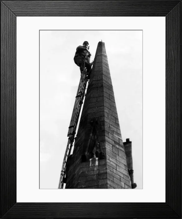 Framed Print : A steeplejack repairing a chuch spire on 2nd May 1968 Framed Print : A steeplejack repairing a chuch spire on 2nd May 1968
