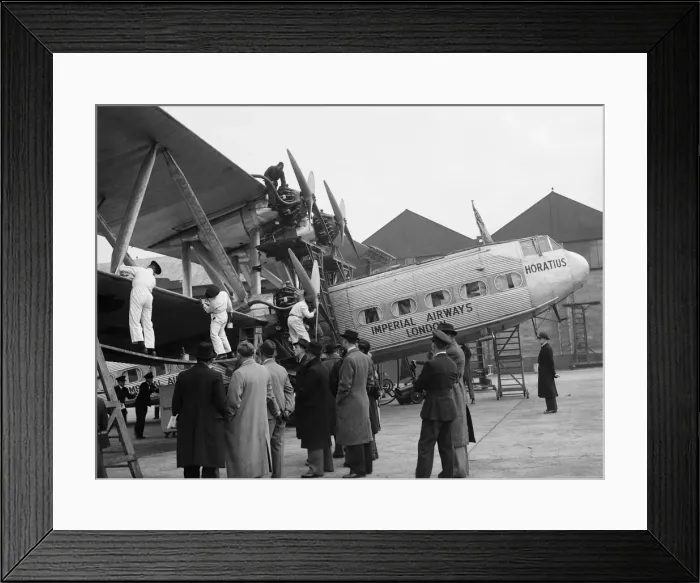 Framed Print : Ground crew seen here applying Killfrost'anti icing agent to the wings of