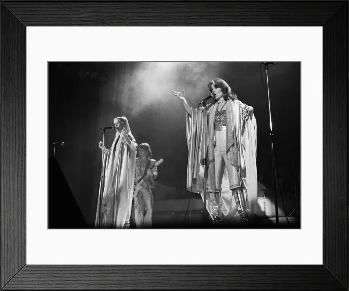 Framed Print : Swedish pop group ABBA consisting of Agnetha Faltskog, Bjorn Ulvaeus, Benny Andersson and Anni-Frid Lyngstad, pictured performing in Birmingham during their Second tour. 10th February 1977 Framed Print : Swedish pop group ABBA consisting of Agnetha Faltskog, Bjorn Ulvaeus, Benny Andersson and Anni-Frid Lyngstad, pictured performing in Birmingham during their Second tour. 10th February 1977