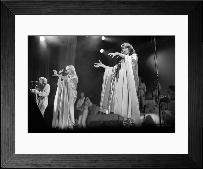 Framed Print : Swedish pop group ABBA consisting of Agnetha Faltskog, Bjorn Ulvaeus, Benny Andersson and Anni-Frid Lyngstad, pictured performing in Birmingham during their Second tour. 10th February 1977 Framed Print : Swedish pop group ABBA consisting of Agnetha Faltskog, Bjorn Ulvaeus, Benny Andersson and Anni-Frid Lyngstad, pictured performing in Birmingham during their Second tour. 10th February 1977