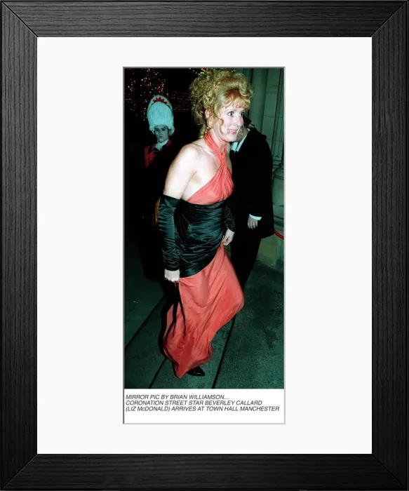 Framed Print : Beverley Callard in pink and black evening dress arriving at Manchester Town Hall
