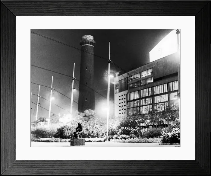 Framed Print : The Shot Tower on the South Bank of the River Thames stands surrounded by the bright