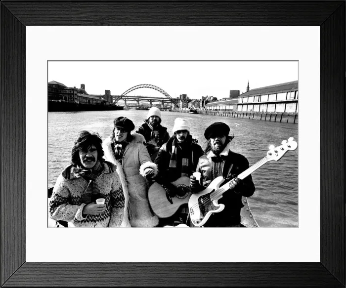 Framed Print : Lindisfarne sailed down the Tyne on a musical journey. The group were filming on board a Framed Print : Lindisfarne sailed down the Tyne on a musical journey. The group were filming on board a