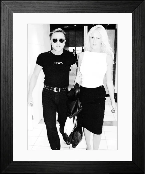Framed Print : Michael Flatley leaves Heathrow Airport December 1999 with girlfriend Lisa Murphy Framed Print : Michael Flatley leaves Heathrow Airport December 1999 with girlfriend Lisa Murphy