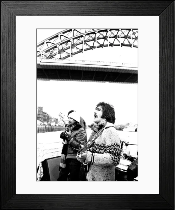 Framed Print : Lindisfarne sailed down the Tyne on a musical journey. The group were filming on board a Framed Print : Lindisfarne sailed down the Tyne on a musical journey. The group were filming on board a