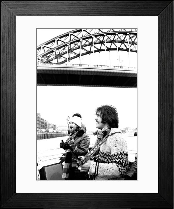 Framed Print : Lindisfarne sailed down the Tyne on a musical journey. The group were filming on board a Framed Print : Lindisfarne sailed down the Tyne on a musical journey. The group were filming on board a