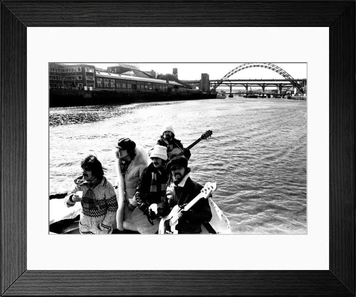 Framed Print : Lindisfarne sailed down the Tyne on a musical journey. The group were filming on board a Framed Print : Lindisfarne sailed down the Tyne on a musical journey. The group were filming on board a