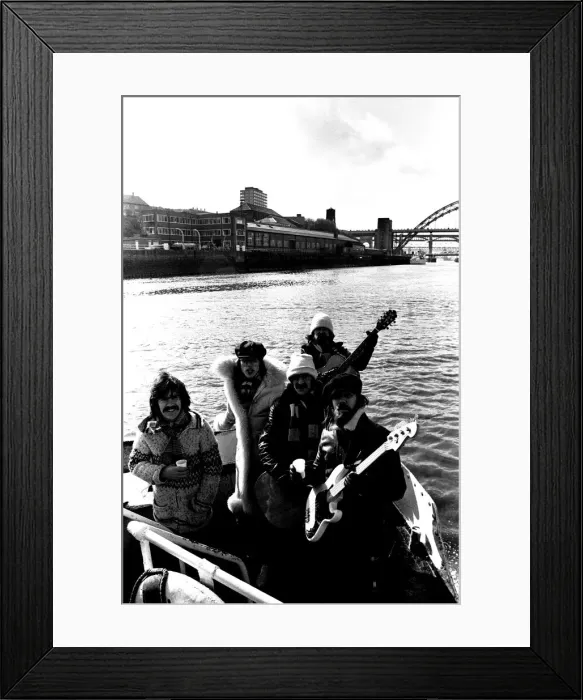 Framed Print : Lindisfarne sailed down the Tyne on a musical journey. The group were filming on board a Framed Print : Lindisfarne sailed down the Tyne on a musical journey. The group were filming on board a
