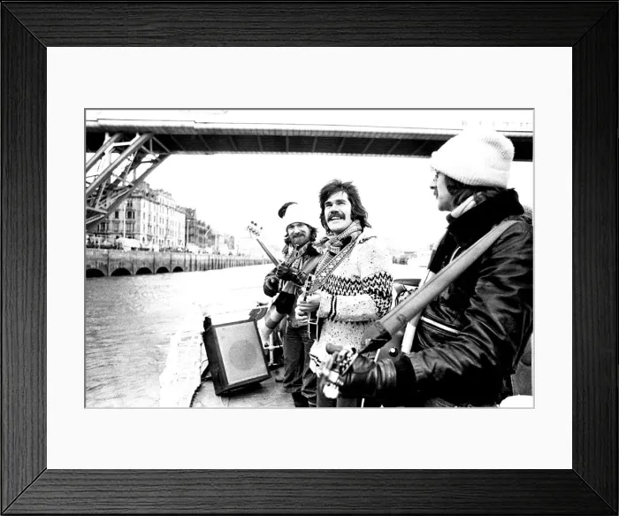 Framed Print : Lindisfarne sailed down the Tyne on a musical journey. The group were filming on board a Framed Print : Lindisfarne sailed down the Tyne on a musical journey. The group were filming on board a