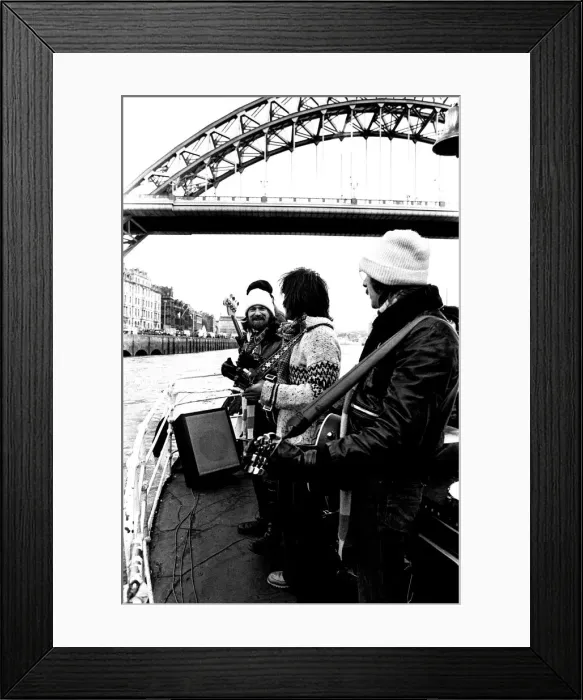 Framed Print : Lindisfarne sailed down the Tyne on a musical journey. The group were filming on board a Framed Print : Lindisfarne sailed down the Tyne on a musical journey. The group were filming on board a