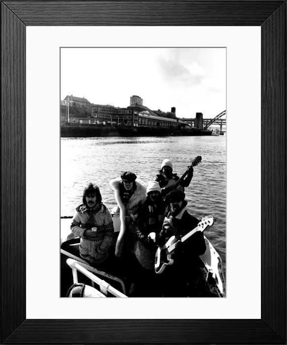 Framed Print : Lindisfarne sailed down the Tyne on a musical journey. The group were filming on board a Framed Print : Lindisfarne sailed down the Tyne on a musical journey. The group were filming on board a