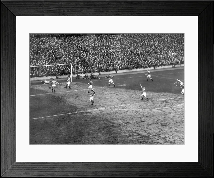 Framed Print : FA Cup semi final replay, 14th March 1951. Birmingham keeper Merrick fails to hold onto a Framed Print : FA Cup semi final replay, 14th March 1951. Birmingham keeper Merrick fails to hold onto a