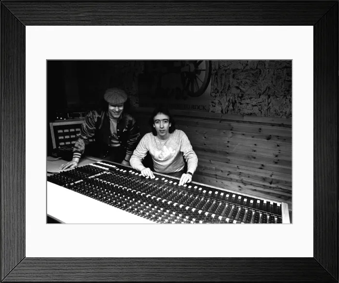 Framed Print : Brian Johnson, lead singer of the rock group AC / DC, with John Craig at the Lynx Studios Framed Print : Brian Johnson, lead singer of the rock group AC / DC, with John Craig at the Lynx Studios