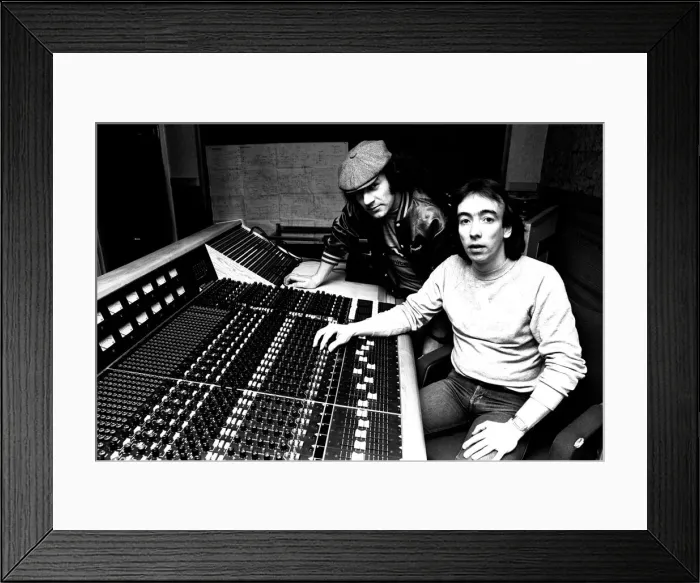 Framed Print : Brian Johnson, lead singer of the rock group AC  /  DC, with John Craig at the Lynx Studios