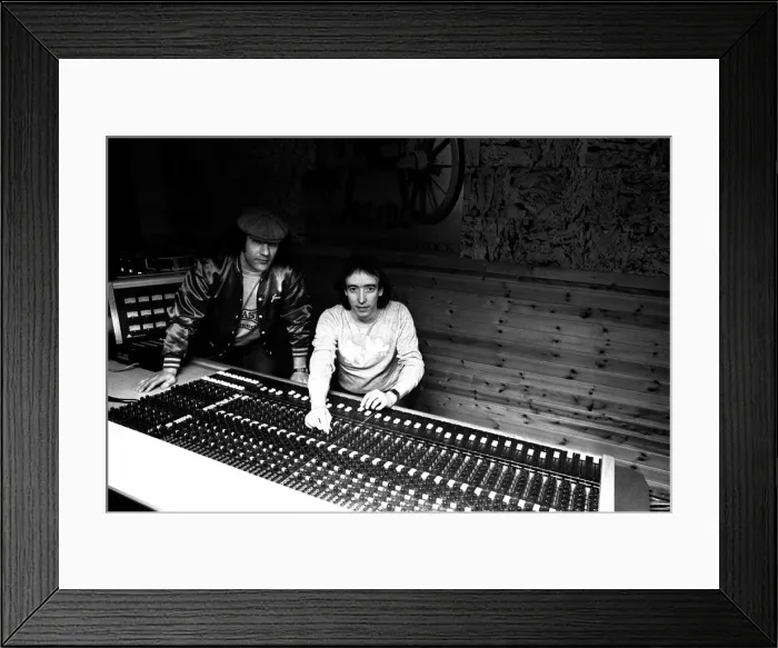 Framed Print : Brian Johnson, lead singer of the rock group AC / DC, with John Craig at the Lynx Studios Framed Print : Brian Johnson, lead singer of the rock group AC / DC, with John Craig at the Lynx Studios