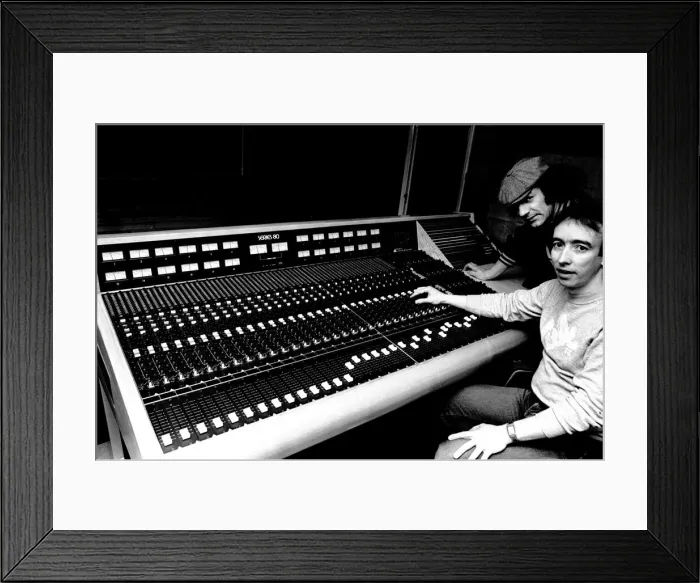 Framed Print : Brian Johnson, lead singer of the rock group AC / DC, with John Craig at the Lynx Studios Framed Print : Brian Johnson, lead singer of the rock group AC / DC, with John Craig at the Lynx Studios