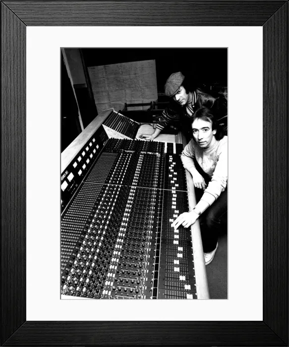 Framed Print : Brian Johnson, lead singer of the rock group AC / DC, with John Craig at the Lynx Studios Framed Print : Brian Johnson, lead singer of the rock group AC / DC, with John Craig at the Lynx Studios