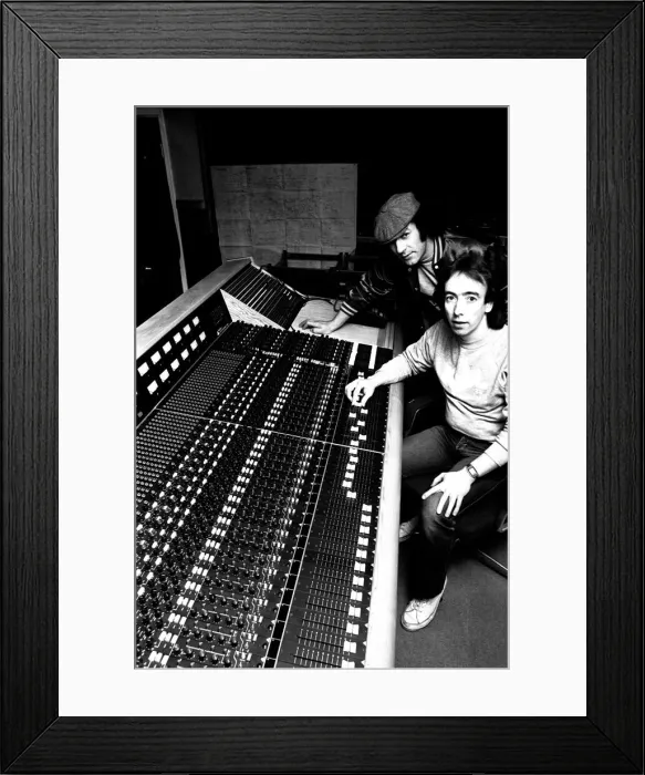 Framed Print : Brian Johnson, lead singer of the rock group AC / DC, with John Craig at the Lynx Studios Framed Print : Brian Johnson, lead singer of the rock group AC / DC, with John Craig at the Lynx Studios