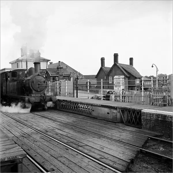 A small tank engine pulls into the railway station at Halesworth Suffolk